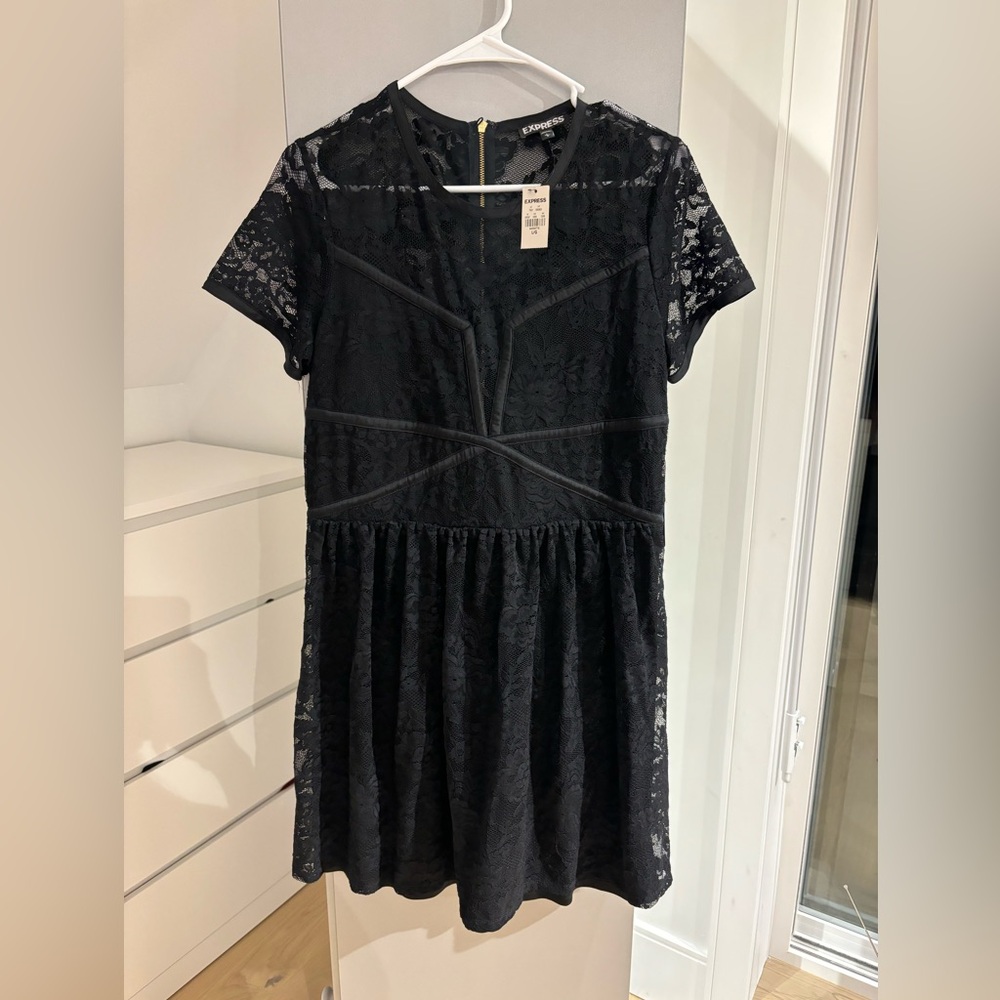 Brand new with tags lace dress size L (fit small like a M).